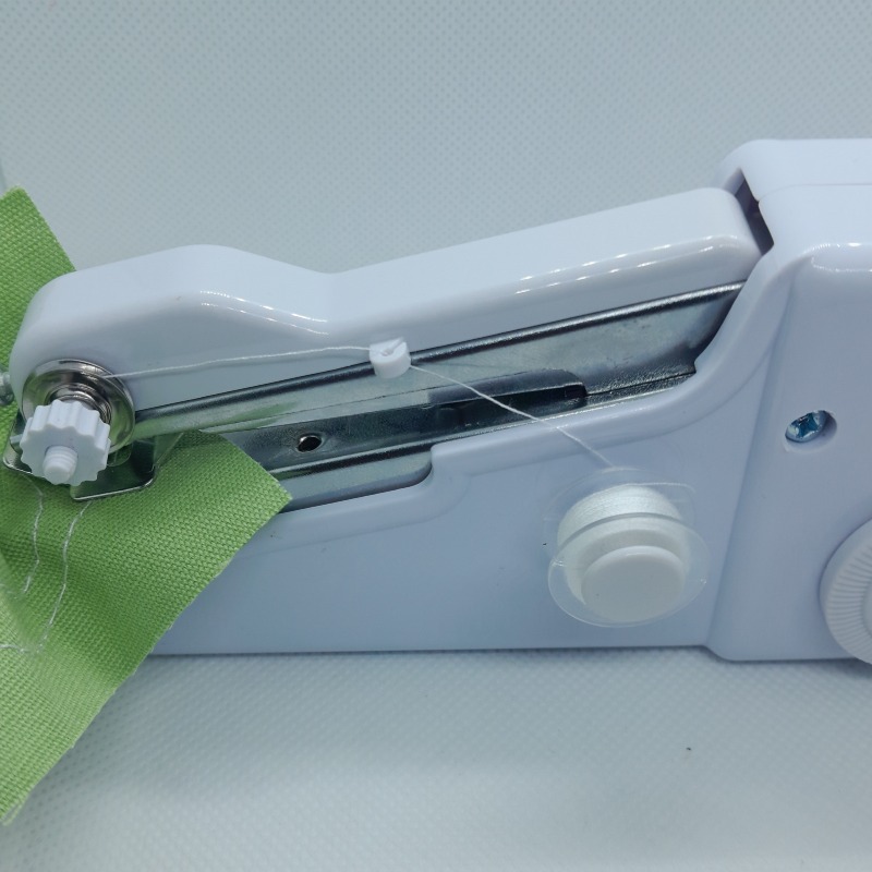 Mini Machine à Coudre Portative Handy Stitch - Léger, Pratique et Complet avec Accessoires (8 Bobines, Aiguilles, Épingles, etc.)
