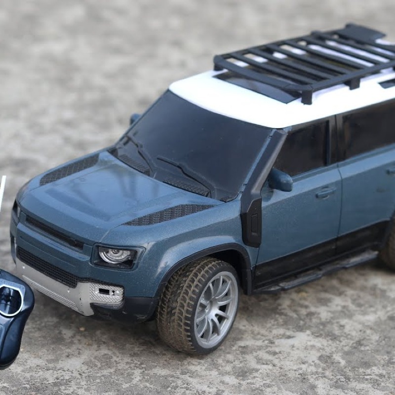 Voiture Télécommandée Land Rover Spray Car 1:16 – SUV Réaliste avec Effets Vapeur, Lumières LED et Batterie Rechargeable